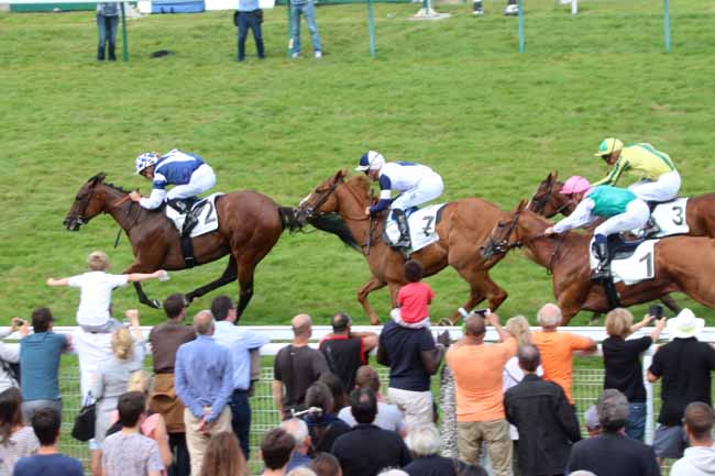 Photo d'arrivée de la course pmu PRIX DU CALVADOS - ASSOCIATION DES JOCKEYS à DEAUVILLE le Samedi 20 août 2016