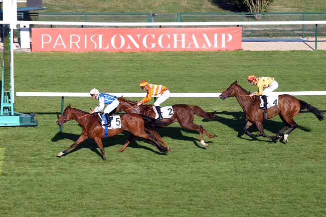 Photo d'arrivée de la course pmu PRIX DE LA PORTE MAILLOT à LONGCHAMP le Jeudi 4 juillet 2019