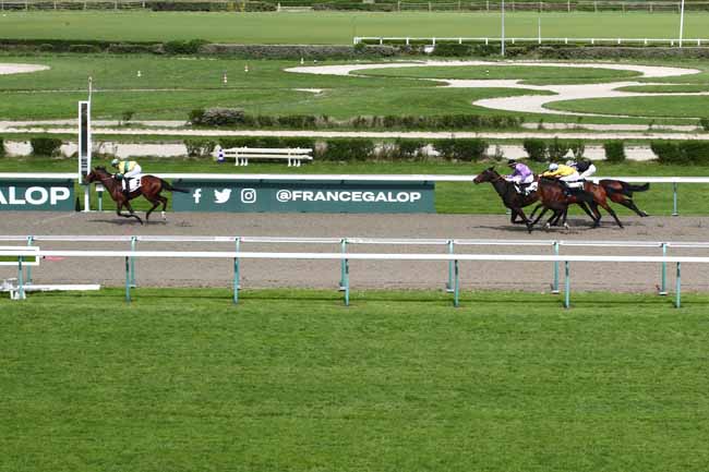 Photo d'arrivée de la course pmu PRIX D'ASNELLES à DEAUVILLE le Mardi 9 avril 2024