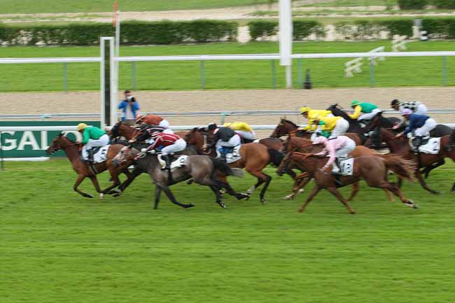 Photo d'arrivée de la course pmu PRIX DU COLISEE à DEAUVILLE le Samedi 4 juin 2016