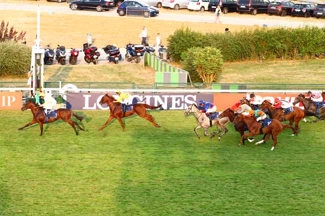 Photo d'arrivée de la course pmu LONGINES HANDICAP DE LA FETE NATIONALE à LONGCHAMP le Samedi 14 juillet 2018