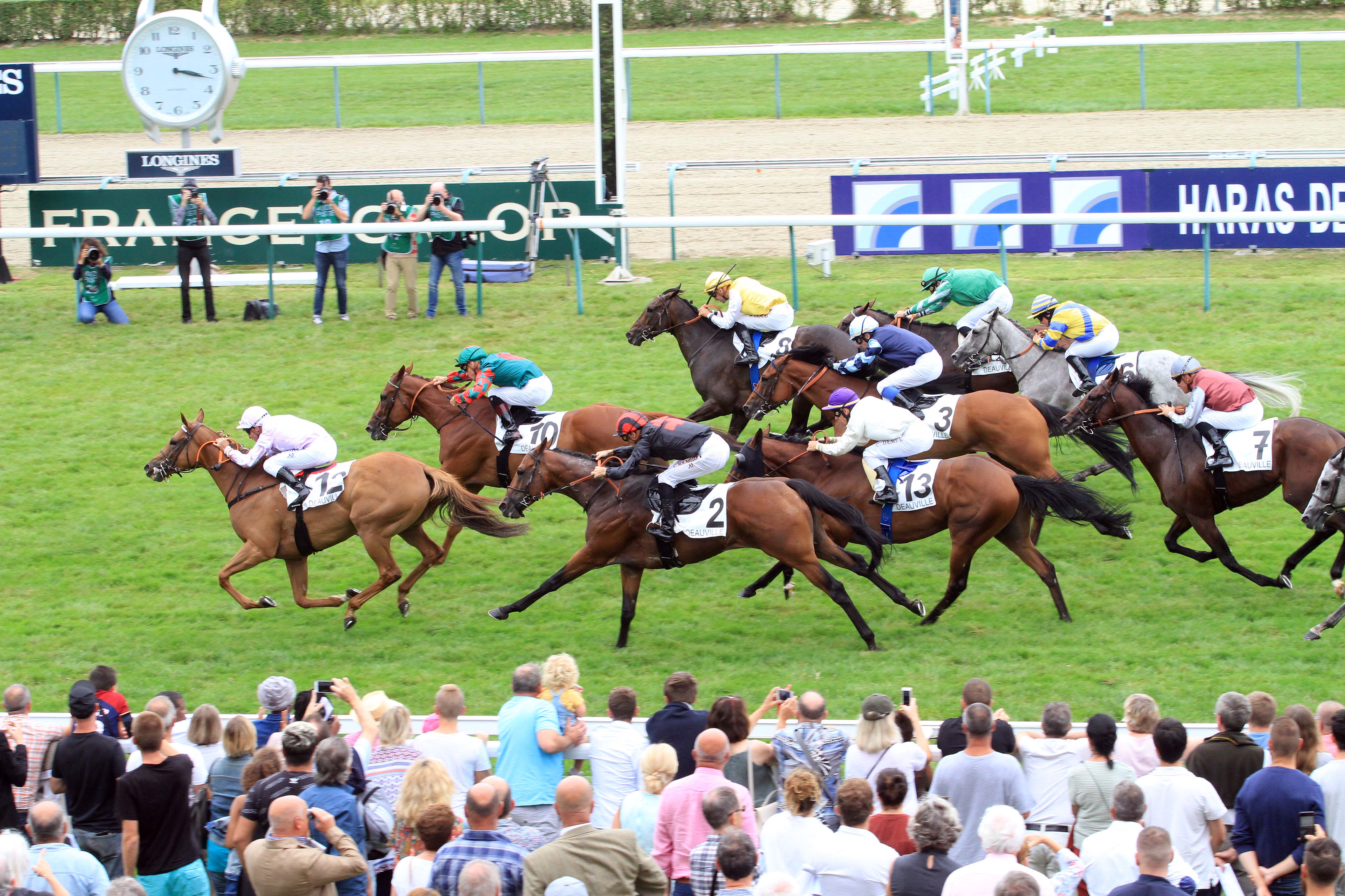 Photo d'arrivée de la course pmu GRAND HANDICAP DE DEAUVILLE à DEAUVILLE le Dimanche 12 août 2018