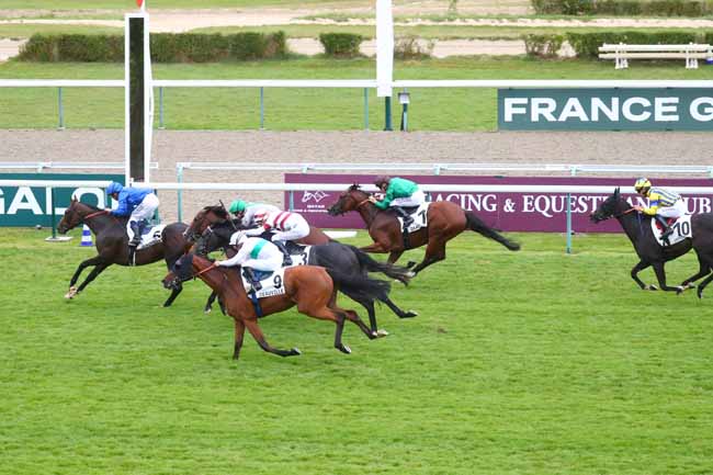 Photo d'arrivée de la course pmu PRIX DE DIVES à DEAUVILLE le Mardi 6 août 2024